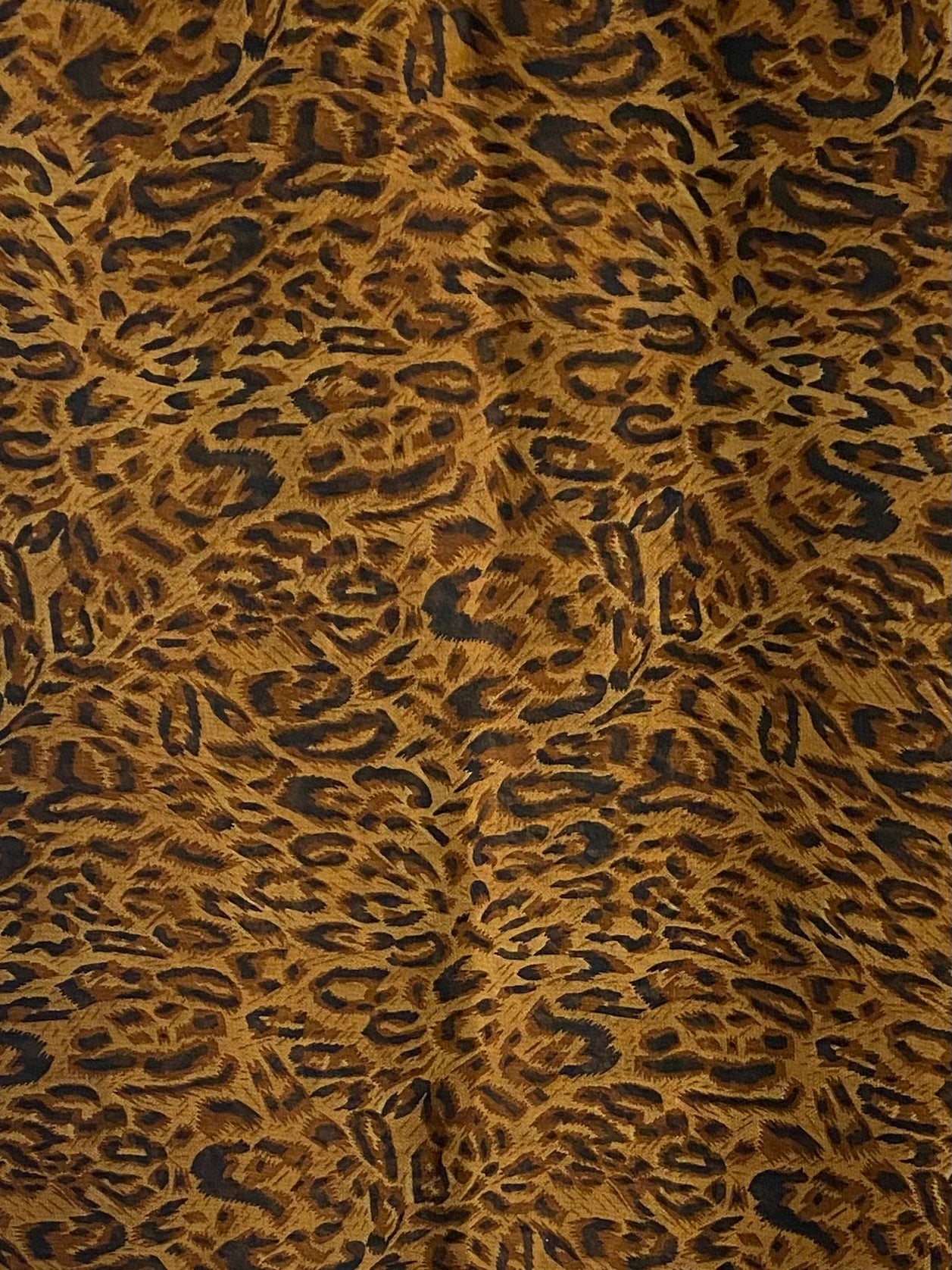 Sleek orange cheetah print hijab