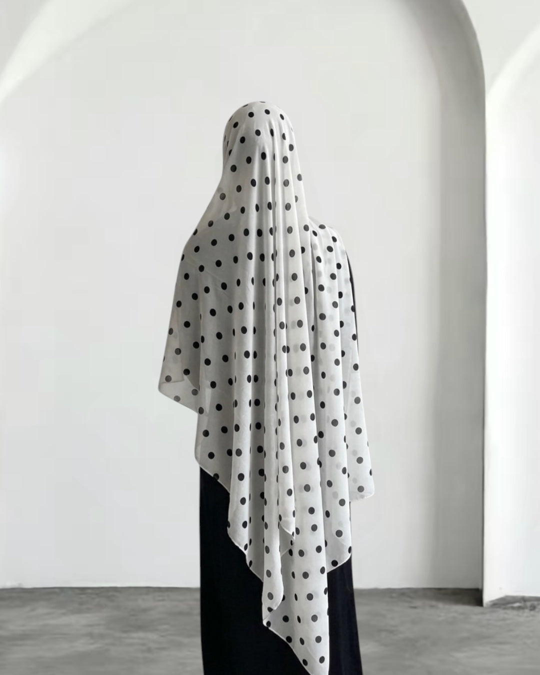 Ghostly ZEYNAD polka dot print